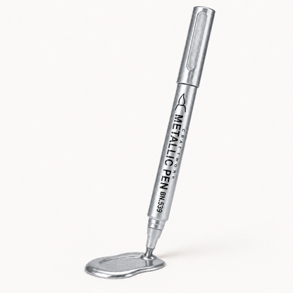 Gold-colored gravestone pen for restoring faded engravings